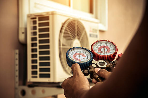 Professional Air Conditioning Service technician working in Sybertsville, PA